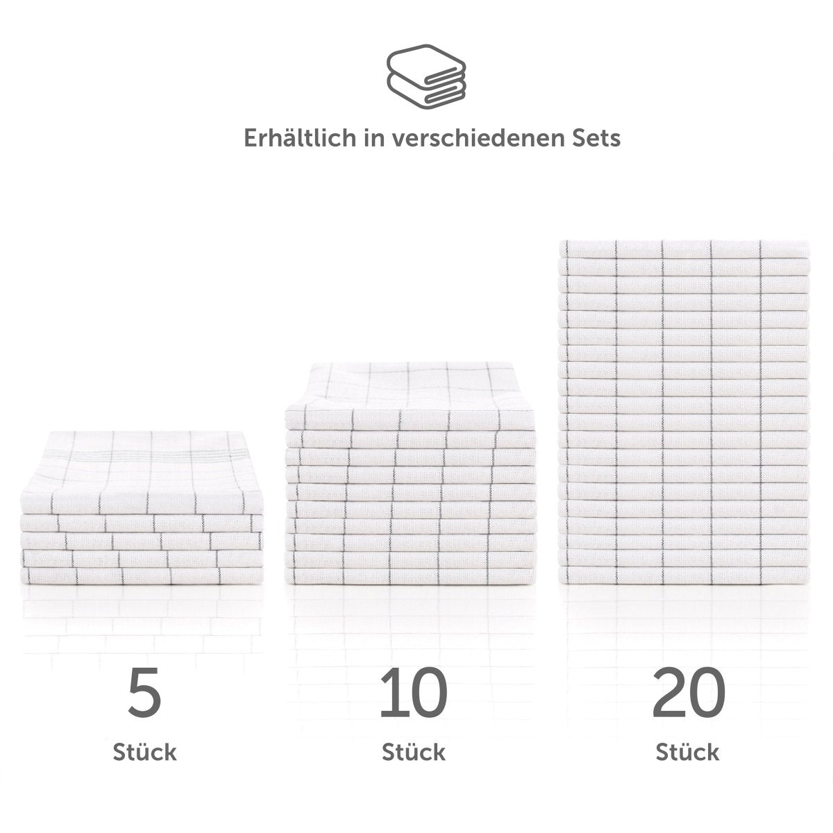 Verschiedene Sets von Geschirrtüchern gestapelt.
