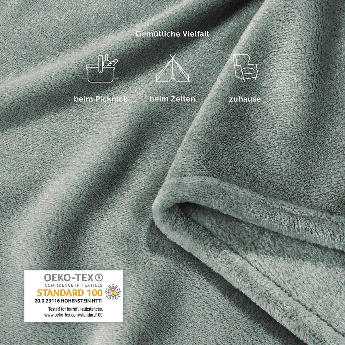 Detailansicht der salbeigrünen Fleece-Kuscheldecke mit Piktogrammen für vielfältige Einsatzmöglichkeiten wie Picknick, Zelten und zu Hause, inklusive OEKO-TEX Standard 100 Siegel.