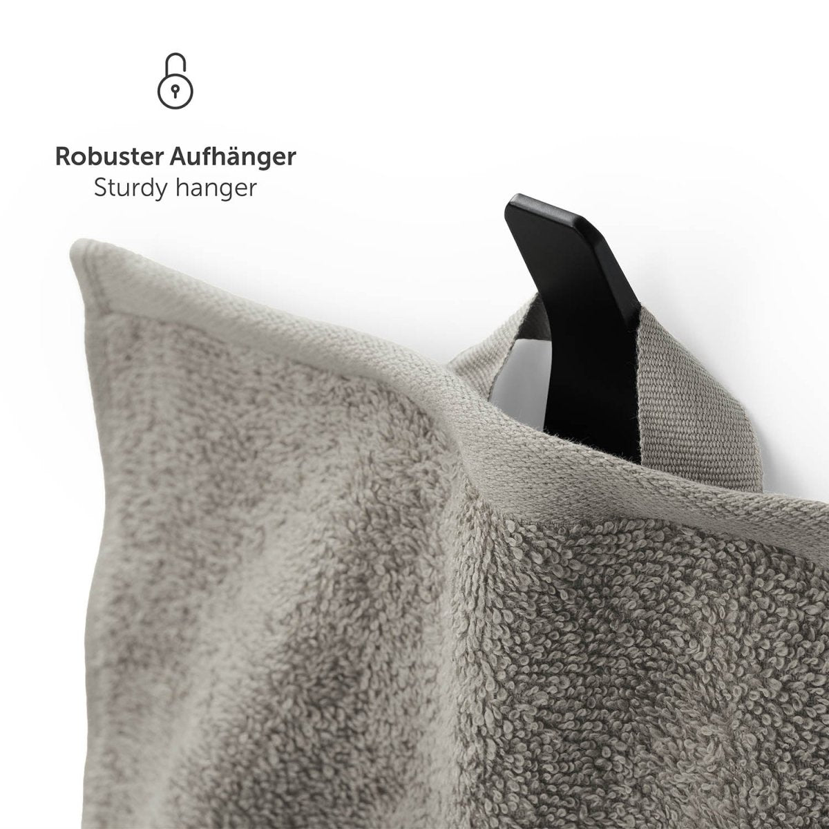 Handtuch aufgehängt an einem schwarzen Haken mit Text Robuster Aufhänger in weißer Schrift
