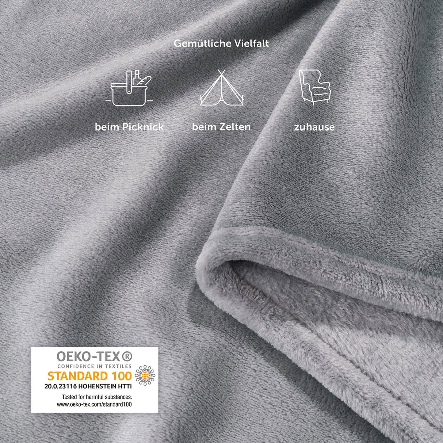 Gefaltete graue Fleecedecke mit Icons, die Anwendungsmöglichkeiten darstellen: beim Picknick, beim Zelten, zuhause.