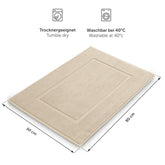 Beige Handtuch mit Trockner- und Waschsymbolen Maßangaben.
