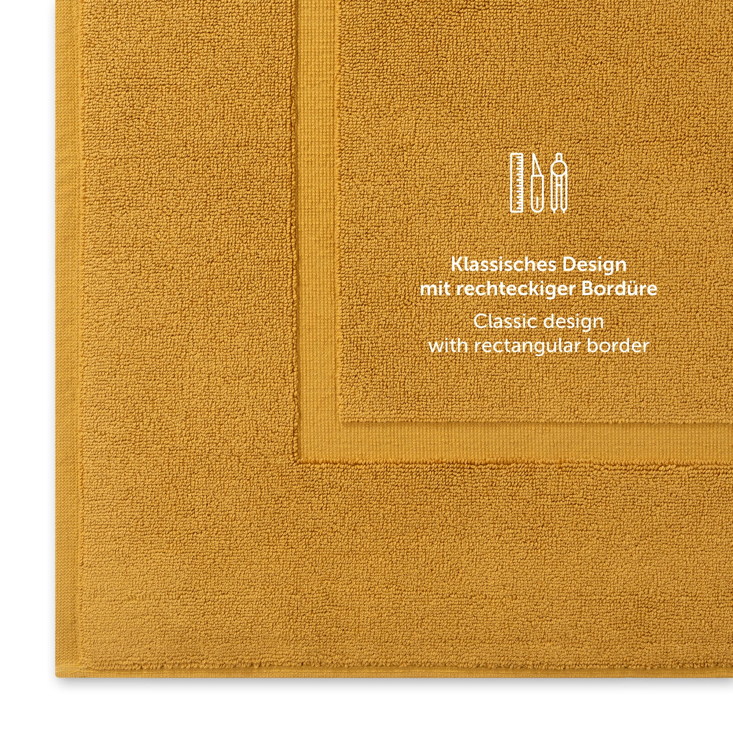 Gelbes Handtuch mit klassischem Design und Bordürendetail.