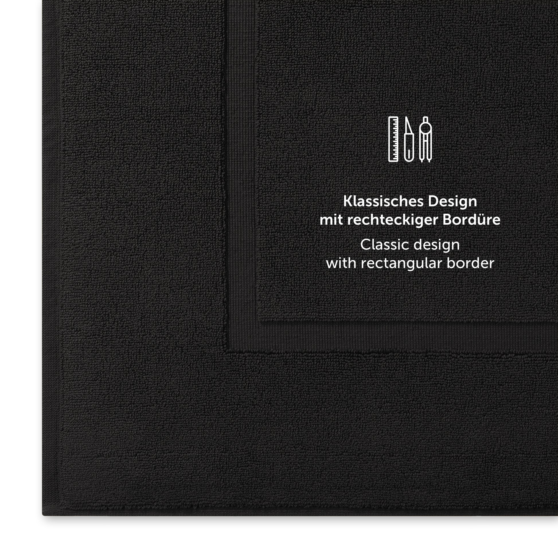 Schwarzes Handtuch mit klassischem Design und Bordürendetail.
