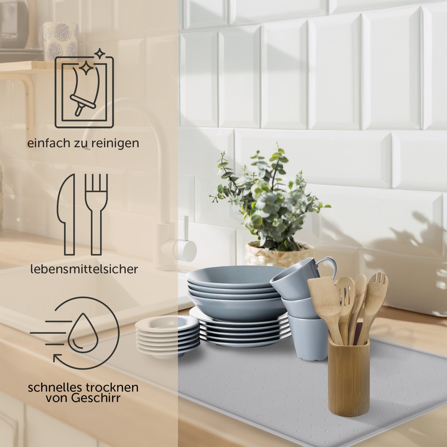 Silikon-Unterlage auf Küchentresen mit Geschirr und Küchenutensilien zur Veranschaulichung der Nutzungsmöglichkeiten