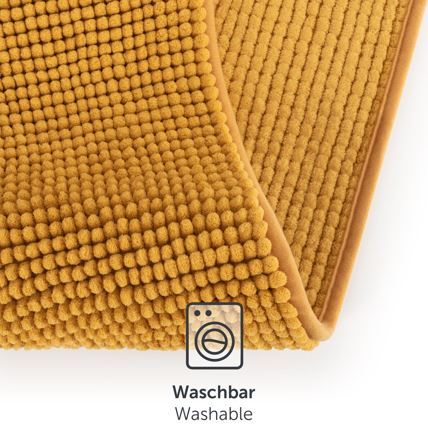 Nahaufnahme der Textur und Waschbarkeit der gelb Chenille-Badematte.
