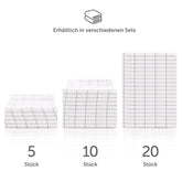 Verschiedene Sets von Geschirrtüchern gestapelt.