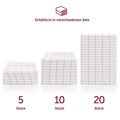 Verschiedene Sets von Geschirrtüchern gestapelt.